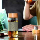Gourde en verre et bois