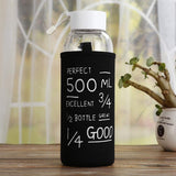 bouteille en verre avec housse